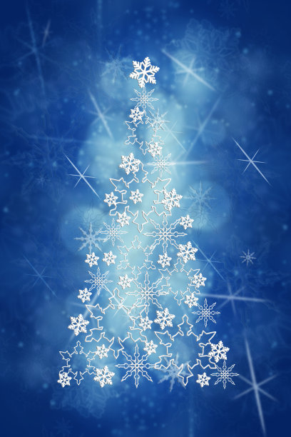 圣诞节和新年的蓝色背景与圣诞树由白色的雪花。模糊的圣诞背景与散景。图片下载