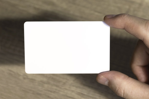 在木制背景上模拟商业概念。前视图。图片下载