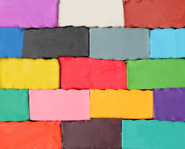 彩色的橡皮泥，类似于砖，作为背景。图片下载