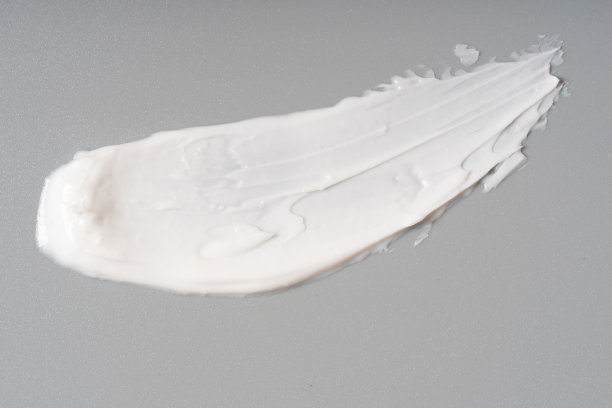 白色化妆面霜纹理上的白色背景图片下载