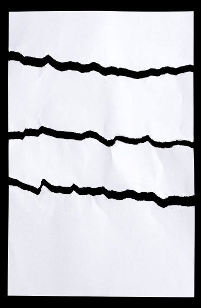 撕破的白纸孤立在黑色的背景上图片下载
