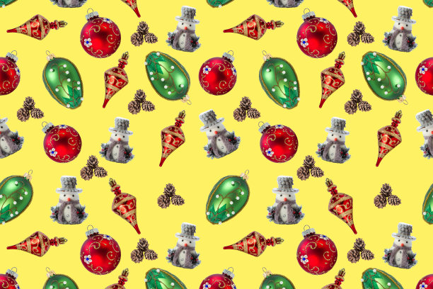 黄色背景上的圣诞玩具无缝图案图片下载