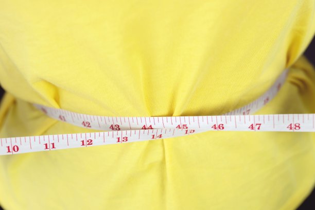 肥胖的女人想减肥，节食。图片下载