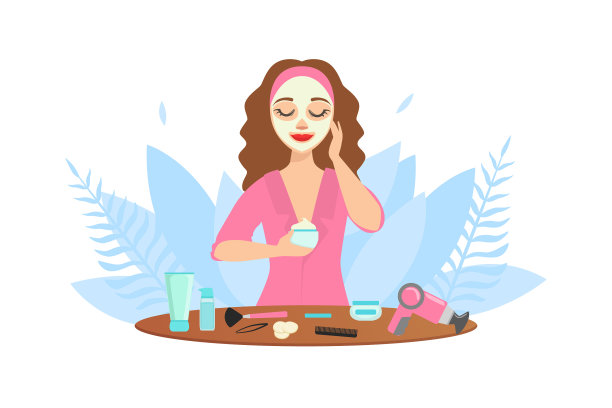 年轻漂亮的女人在做面部护肤图片下载