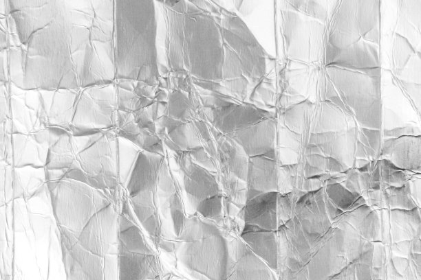 抽象的背景。使用过的牛奶包装可回收利用。图片下载