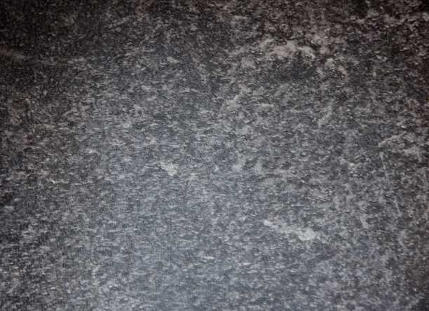 黑色大理石与白色纹理和飞溅，抛光的石头的强烈特写。图片下载