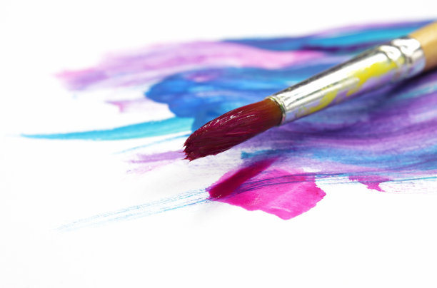 特写笔刷和彩色背景上的油漆图片下载