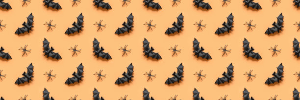 万圣节无缝图案有黑蜘蛛、蝙蝠、橘色趣味装饰。图片下载