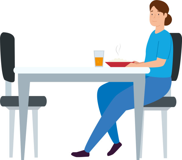 年轻女子呆在家里的桌子上吃饭图片下载