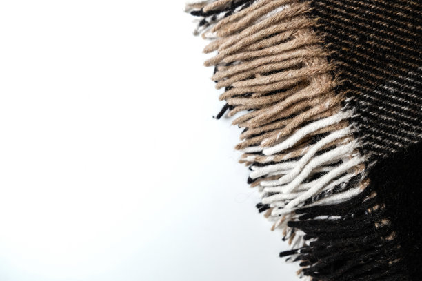 有长边的棕色格子毯子。图片下载