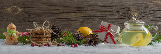 用柠檬茶。圣诞快乐。新年的旗帜。预防感冒。早餐。圣诞节的背景图片下载