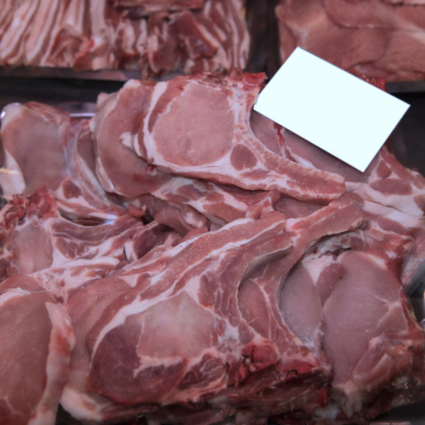 原始的猪排。副本的空间。图片下载