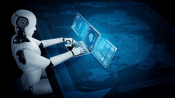 人形机器人使用笔记本电脑，坐在桌子前进行全球网络连接图片下载
