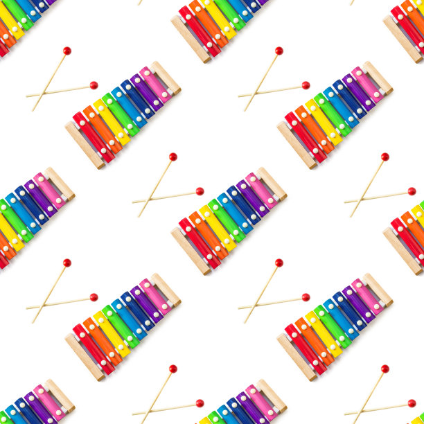 无缝图案的彩虹彩色木制玩具8音木琴钟琴孤立在白色背景与剪切路径。金属和木头制成的玩具钟琴。音乐,充满活力。节奏,听。图片下载