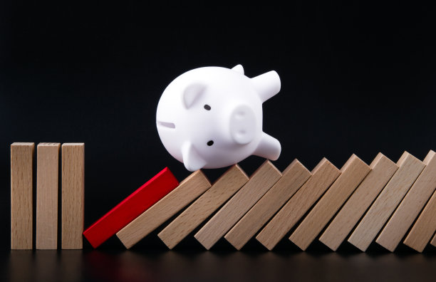 存钱罐停止多米诺骨牌效应的概念为企业。图片下载
