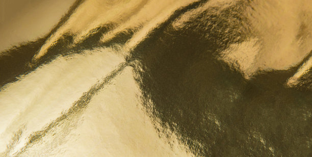 金箔纹理背景。金色纹理和渐变阴影。图片下载