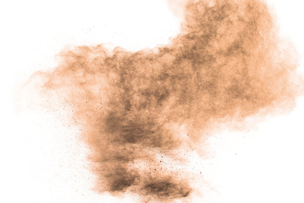 冻结运动棕尘爆炸。阻止棕色粉末的移动。白色背景上有爆炸的棕色粉末。图片下载
