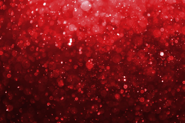 红色抽象散景背景。图片下载