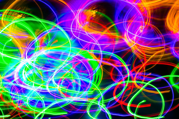 冻结光照片。抽象的未来主义，霓虹图案背景在波浪形状。图片下载