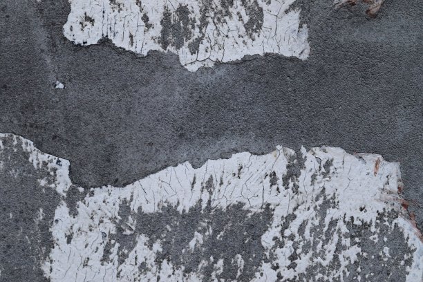 详细的近距离观察老化的混凝土墙裂缝和许多结构图片下载