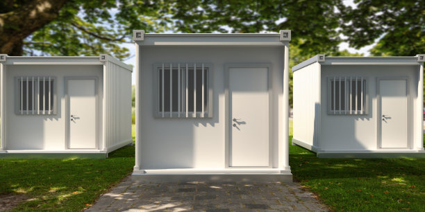 以绿色自然公园为背景的集装箱箱。三维演示图片下载