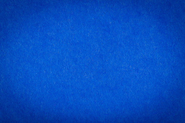 蓝色毛毡的质地。椭圆形的小插图。背景。图片下载