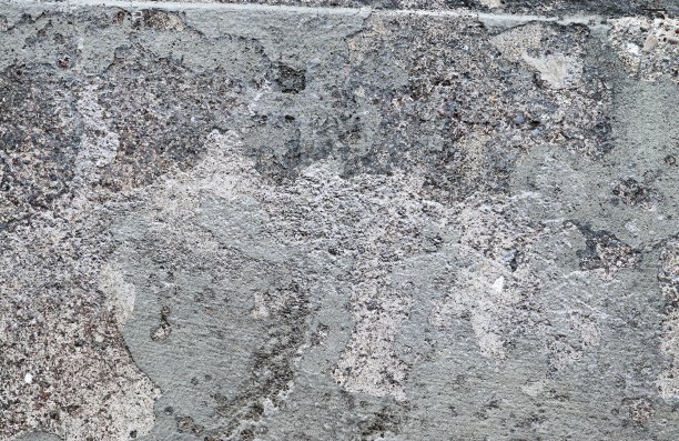 详细的近距离观察老化的混凝土墙裂缝和许多结构图片下载