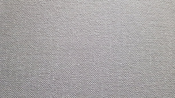 灰色壁纸。壁纸背景灰色纹理。干净的背景。图像与复制空间和照明的地方为您的设计图片下载