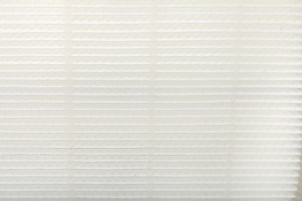 纹理的空气滤清器特写带棱纹纸元件，以清洁气流和灰尘。图片下载