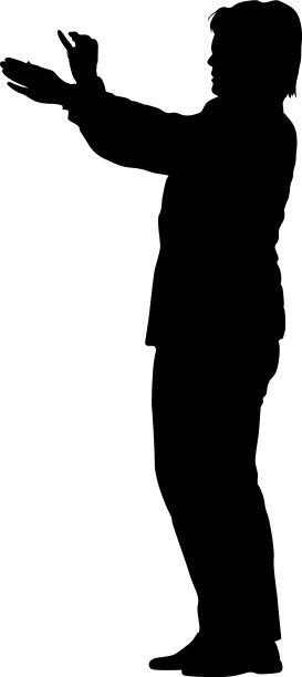 女性用智能手机自拍的剪影图片下载