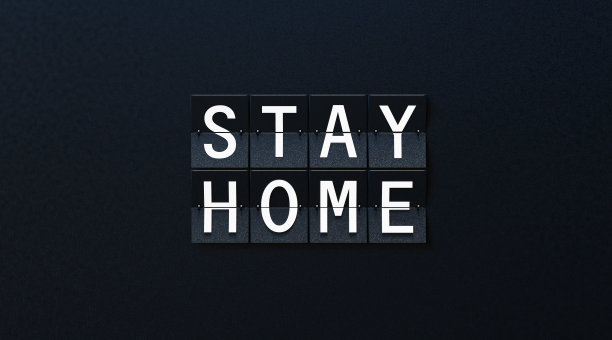 呆在家里写在黑色背景下的机场广告牌图片下载