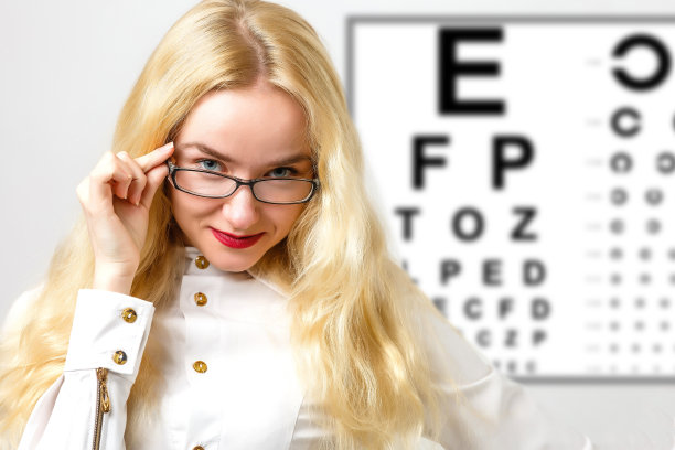 美丽的女人激光全息图和测试视力表图片下载