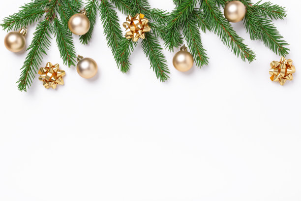 圣诞作文与冷杉树枝和金色的圣诞球在白色的背景。前视图。本空间图片下载