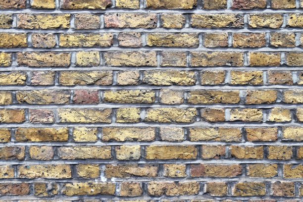 古老的砖墙。纹理古老的风化砖墙全景背景图片下载