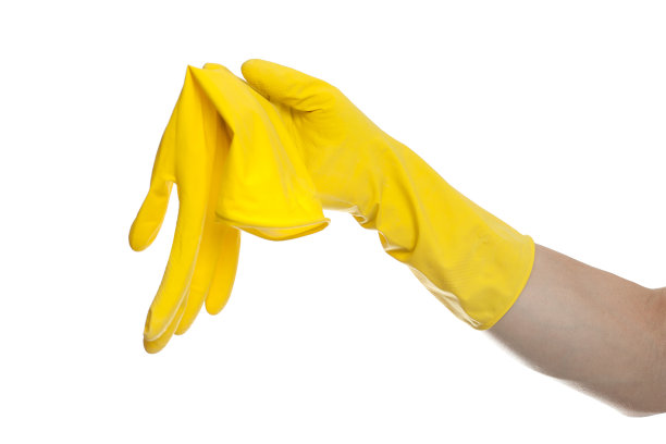 黄色橡胶手套清洁在白色背景，济贫院的概念图片下载