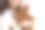 女孩抱着一只棕色的狗孤立在白色的背景上。年轻迷人的女人与狗约克郡梗微笑。近距离的照片。宠物护理。人们和宠物。图片下载