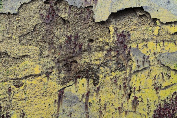 详细的近距离观察老化的混凝土墙裂缝和许多结构图片下载