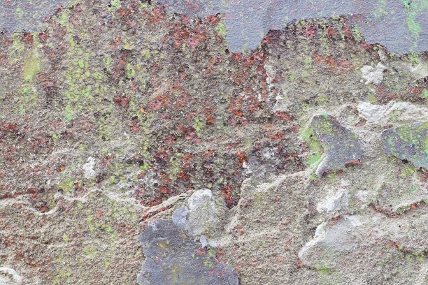 详细的近距离观察老化的混凝土墙裂缝和许多结构图片下载