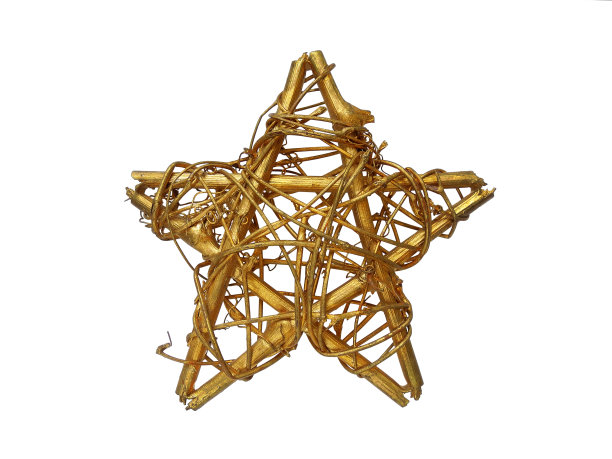 手工制作的金色圣诞星，从木制的小树枝和藤孤立图片下载