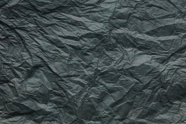 皱巴巴的灰色纸张背景图片下载