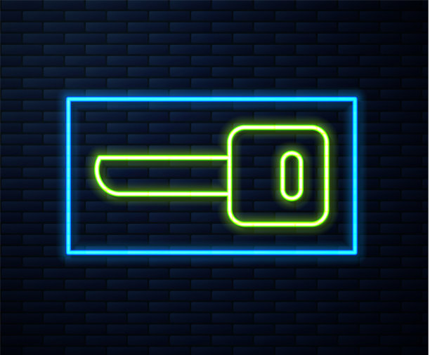 霓虹灯线键图标孤立在砖墙上图片下载