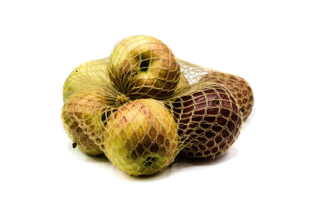 网中的苹果孤立在白色的背景上图片下载