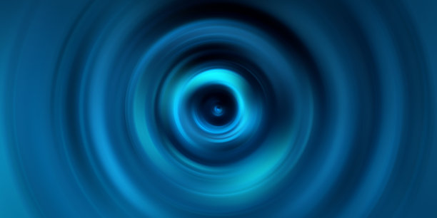 梯度蓝色催眠螺旋。抽象的背景图片下载