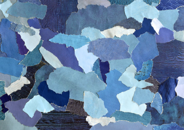 拼贴情绪板与蓝色的概念。这张纸是用撕破的旧杂志废纸和印刷品制成的。创造性的现代艺术的结果。图片下载