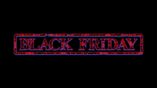 “黑色星期五”。黑色背景上的霓虹灯。传统的圣诞销售季节开始了。图片下载