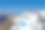 圣托里尼岛伊亚火山口边缘的蓝色圆顶教堂图片下载