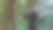 一个时髦的年轻人戴着兜帽看着镜头的肖像。近距离观看千禧男孩在黑色帽衫微笑站在街上。人的情感概念图片下载