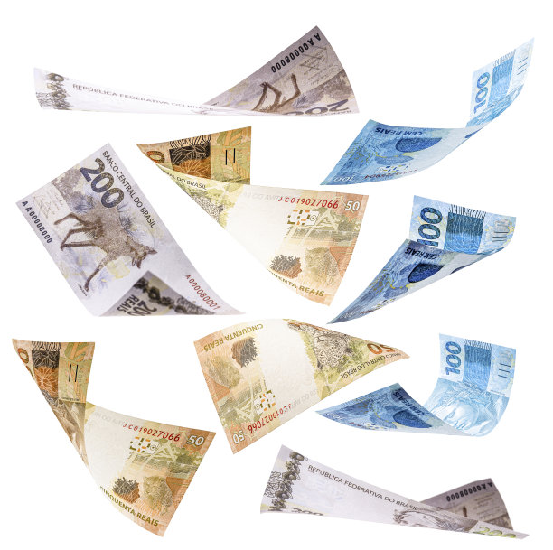 许多来自巴西的钞票落在白色的背景上，200,150雷亚尔自由落体图片下载