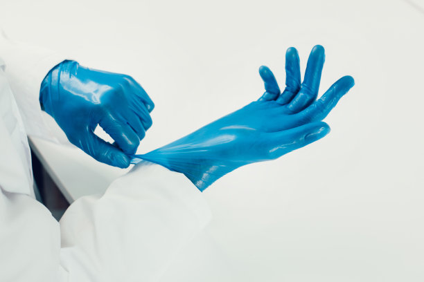 关闭了。医生戴上防护手套图片下载
