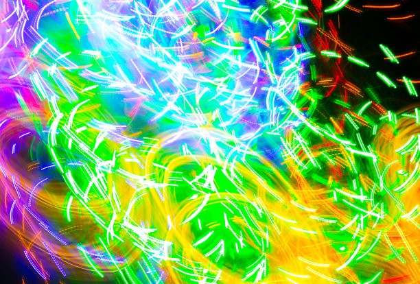 冻结光照片。抽象的未来主义，霓虹图案背景在波浪形状。图片下载